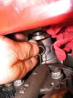 timing belt tensioning - checking tensioner hole alignment with grenade pin.JPG