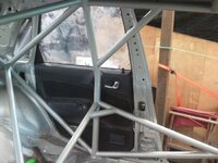 Rear door card trimmed around cage.jpg