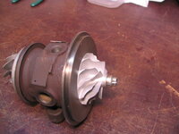 center housing after rebuild - compressor end.JPG