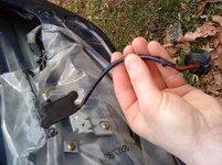 WTB 1G passenger door lock sensor for seatbelt tract.