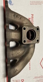 1G stock exhaust manifold.