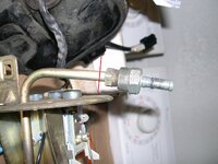 Talon stock hose barb after you remove the hose - with red cut line.jpg